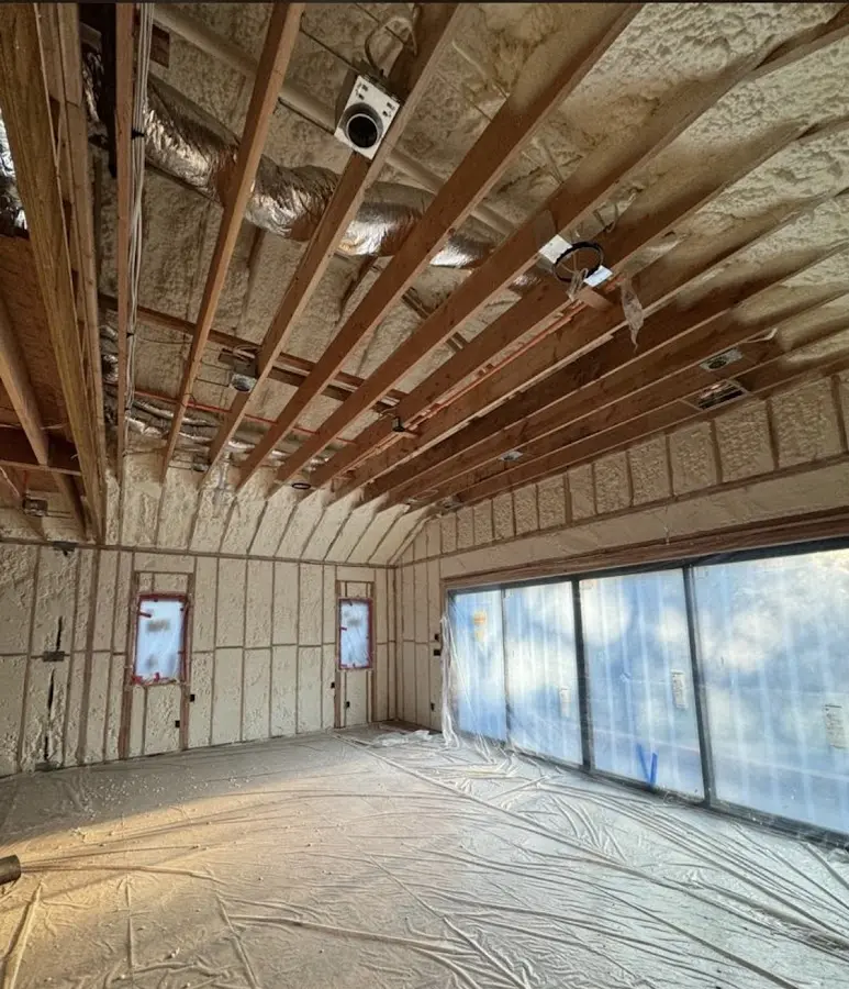 Interior walls and ceiling insulated with spray foam during new construction in St. Peters